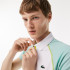 Polo Lacoste Sport com fecho de correr e carcela contrastante Ténis branco para homem