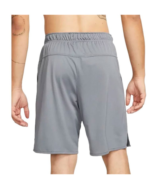 Calça Fitness Nike Homem de Dri-Fit Totality 9"...