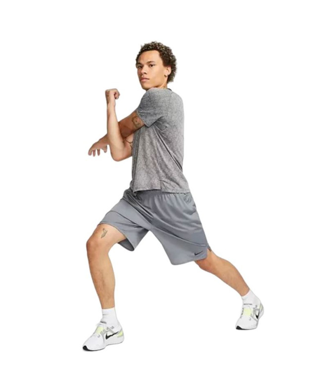 Calça Fitness Nike Homem de Dri-Fit Totality 9"...