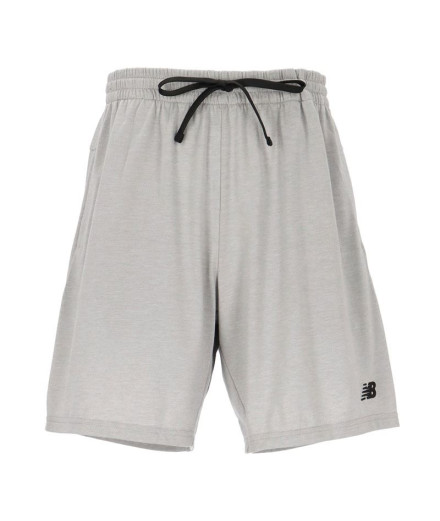 Calça New Balance Homem Sport Essentials Heathertech 7... Calça New Balance Homem Sport Essentials Heathertech 7...