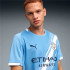 Camiseta de Futebol Puma Manchester City Home Rep Homem Team Light Azul