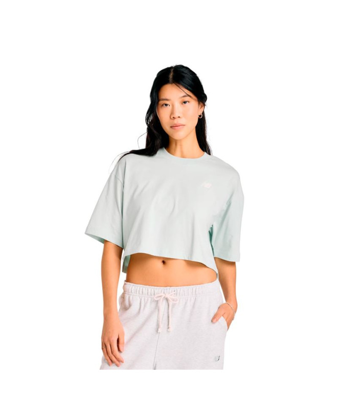 Camiseta de New Balance Reimagined Oversized Waist Cys Mulher
