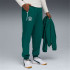 Pantalón de Fútbol Puma Manchester City tech Woven Hombre Malachite/Silver Sky