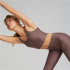 Top de yoga Puma Studio Ultrabare Strappy marrom Mulher