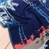 Toalha Praia e piscina Secaneta 100x170 em veludo jacquard. Estampa ondulada Lol Water.