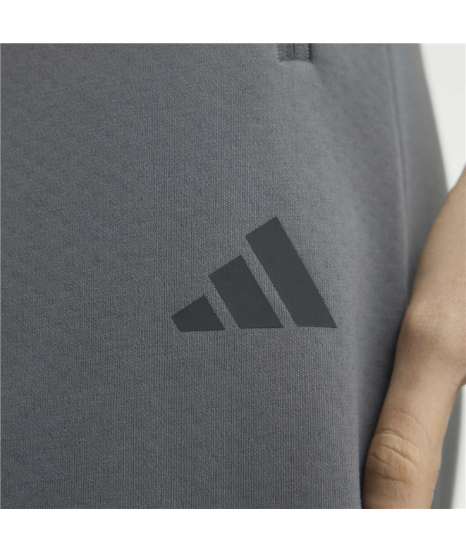 Calça Mulher adidas ZNE com bainha aberta, cinza.