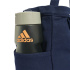 Mala a tiracolo Adidas em lona, nas cores índigo e marfim.