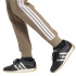 Calça Mulher adidas Essentials 3-Stripes cáqui/branca